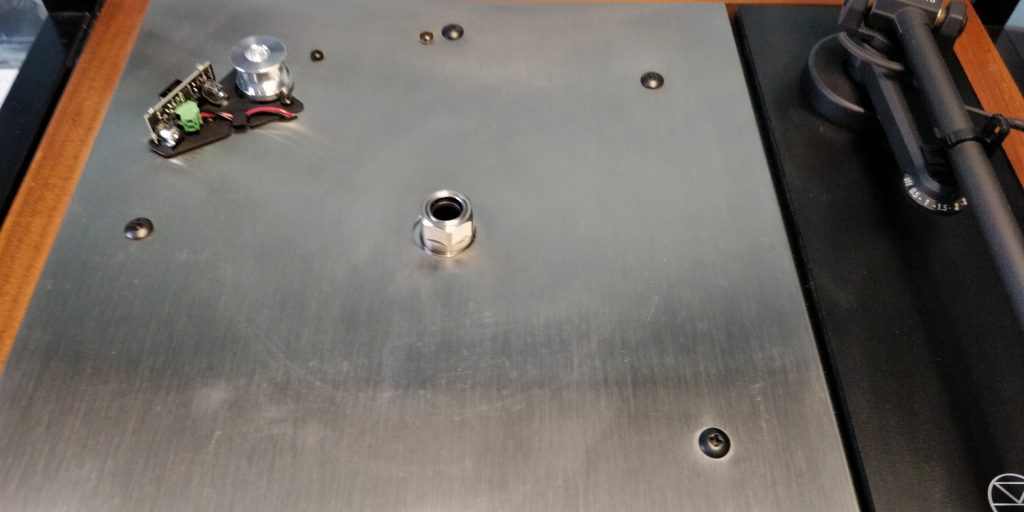 Karousel bearing poking through the top plate